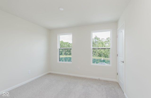 9741 Oleander Dr, Fishers, IN 46250 - empty room featuring light carpet
