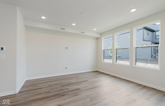 9741 Oleander Dr, Fishers, IN 46250 - spare room featuring wood finished floors and recessed lighting