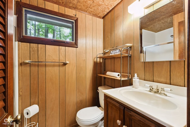 8434 S Christian Dr, Nineveh, IN 46164 - bathroom featuring toilet, vanity, a shower with door, and wooden walls