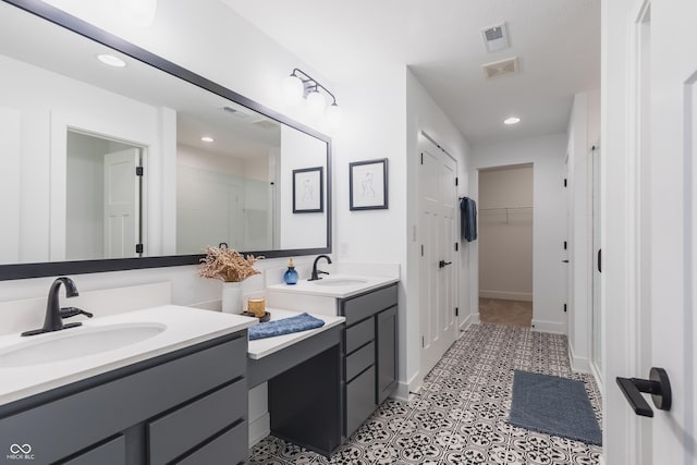 1088 Bevy Blvd, Danville, IN 46122 - full bathroom featuring recessed lighting, vanity, a spacious closet, and a shower stall