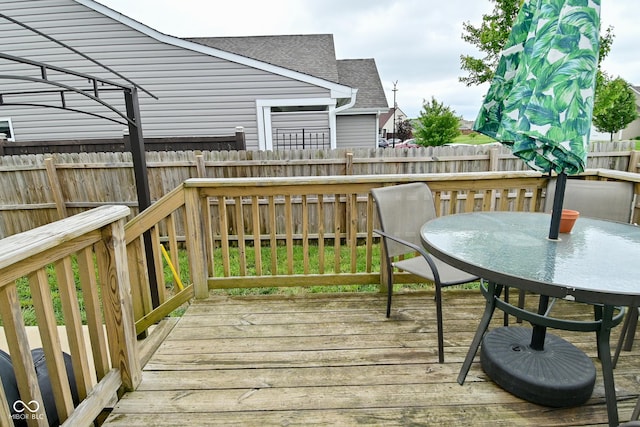 7515 Brattle Dr, Indianapolis, IN 46113 - wooden deck featuring outdoor dining area