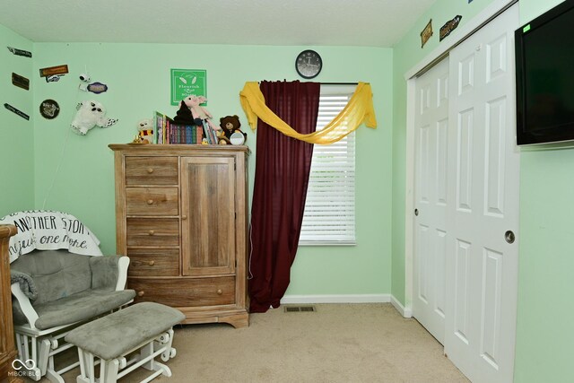 7515 Brattle Dr, Indianapolis, IN 46113 - sitting room featuring light carpet and baseboards