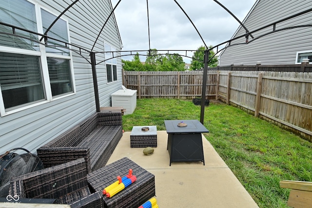 7515 Brattle Dr, Indianapolis, IN 46113 - view of patio / terrace with an outdoor fire pit