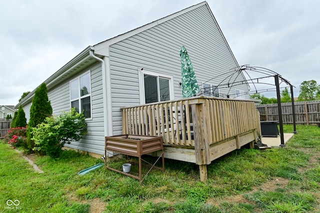 7515 Brattle Dr, Indianapolis, IN 46113 - rear view of property featuring a wooden deck