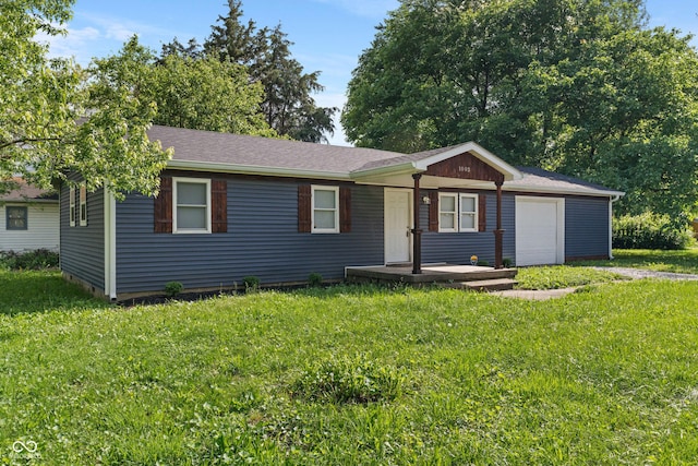 1002 Collier St, Indianapolis, IN 46241 - ranch-style house featuring a garage, a front yard, and driveway