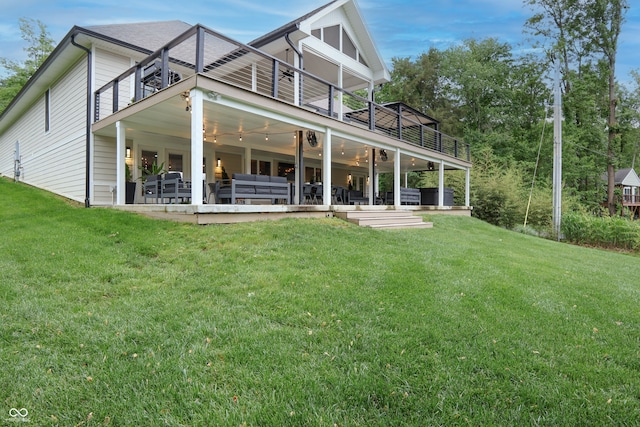 11911 W Grandview Dr, Columbus, IN 47201 - rear view of property featuring an outdoor living space, a yard, a patio, a deck, and a ceiling fan