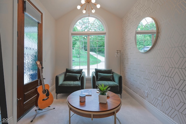 11911 W Grandview Dr, Columbus, IN 47201 - living area featuring wallpapered walls, an accent wall, carpet floors, lofted ceiling, and baseboards