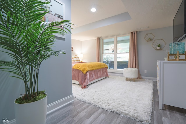 11911 W Grandview Dr, Columbus, IN 47201 - bedroom featuring wood finished floors and baseboards
