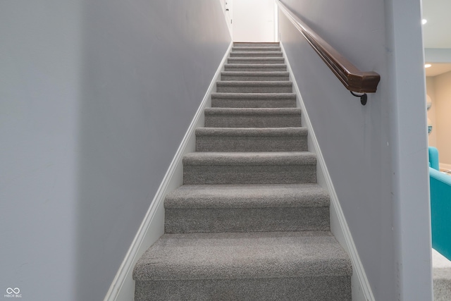 11911 W Grandview Dr, Columbus, IN 47201 - stairway featuring carpet