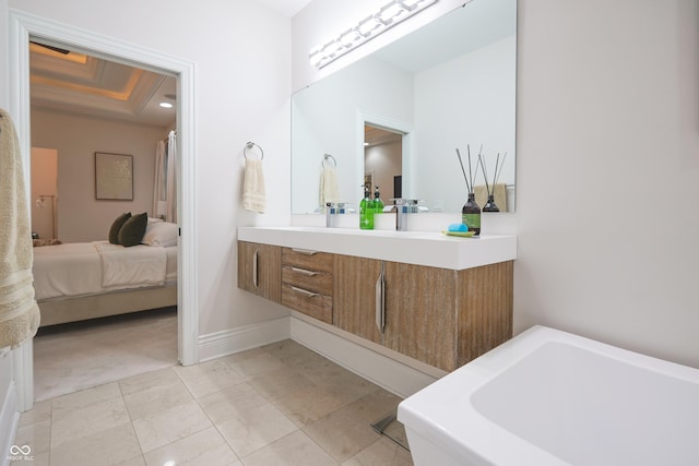 11911 W Grandview Dr, Columbus, IN 47201 - ensuite bathroom featuring vanity and a bathtub