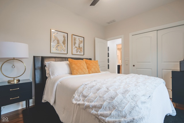 11911 W Grandview Dr, Columbus, IN 47201 - bedroom featuring a closet, dark wood finished floors, and ceiling fan