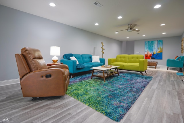 11911 W Grandview Dr, Columbus, IN 47201 - living room featuring wood finished floors, baseboards, recessed lighting, and ceiling fan