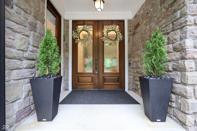 11911 W Grandview Dr, Columbus, IN 47201 - property entrance with french doors and stone siding