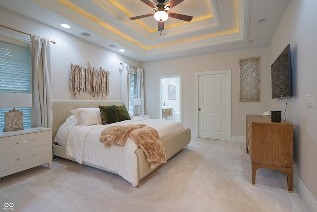 11911 W Grandview Dr, Columbus, IN 47201 - bedroom with a raised ceiling, light carpet, recessed lighting, connected bathroom, and baseboards