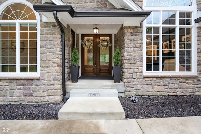 11911 W Grandview Dr, Columbus, IN 47201 - view of exterior entry with stone siding and french doors