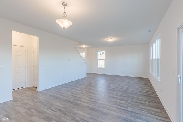 1108 Bevy Blvd, Danville, IN 46122 - empty room with wood finished floors and baseboards