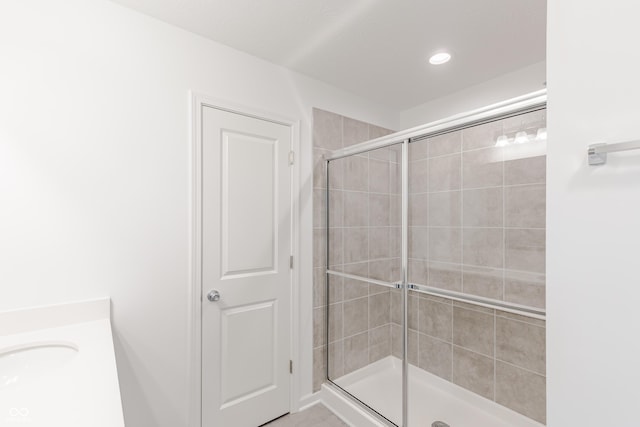 1108 Bevy Blvd, Danville, IN 46122 - full bath featuring a shower stall, recessed lighting, and vanity