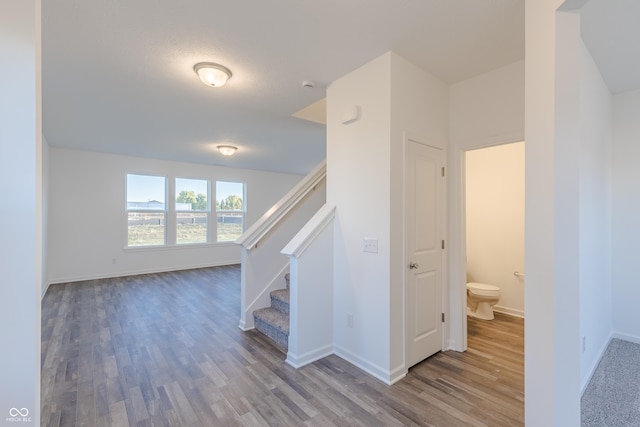 1108 Bevy Blvd, Danville, IN 46122 - staircase featuring wood finished floors and baseboards