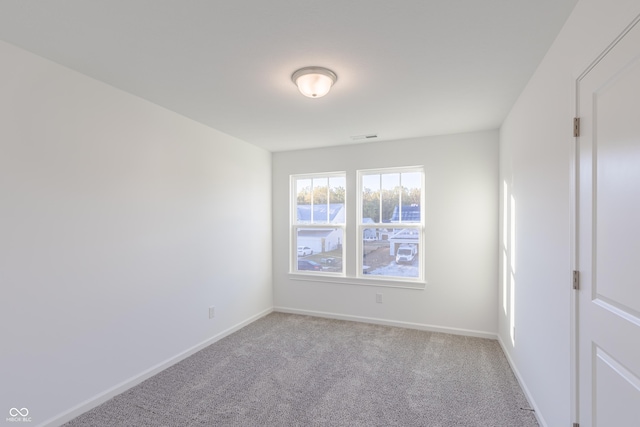 1108 Bevy Blvd, Danville, IN 46122 - unfurnished room with light colored carpet and baseboards