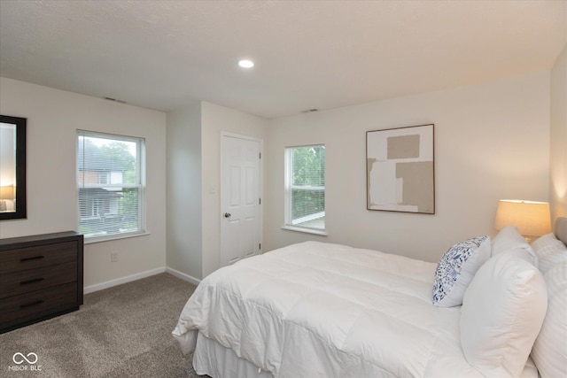 2623 Guilford Ave, Indianapolis, IN 46205 - carpeted bedroom featuring baseboards and recessed lighting
