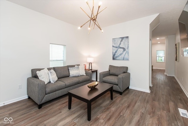 2623 Guilford Ave, Indianapolis, IN 46205 - living area with wood finished floors, a chandelier, and baseboards