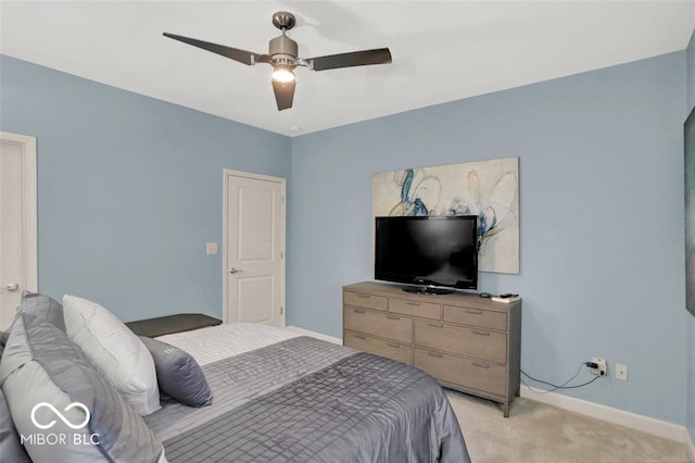 435 Virginia Ave Unit 108, Indianapolis, IN 46203 - bedroom with light colored carpet, baseboards, and a ceiling fan
