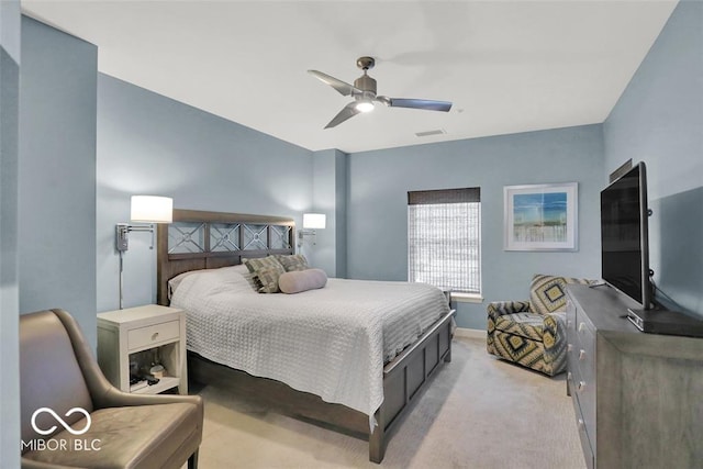 435 Virginia Ave Unit 108, Indianapolis, IN 46203 - bedroom featuring a ceiling fan, carpet flooring, and baseboards