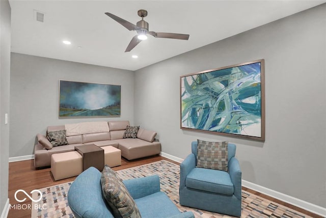 435 Virginia Ave Unit 108, Indianapolis, IN 46203 - living area featuring wood finished floors, baseboards, ceiling fan, and recessed lighting