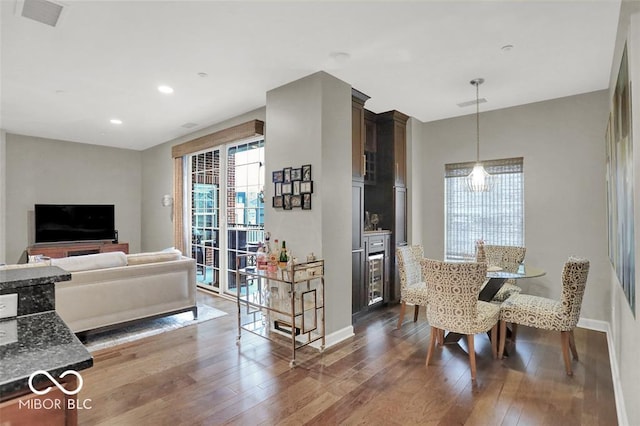 435 Virginia Ave Unit 108, Indianapolis, IN 46203 - living area with hardwood / wood-style floors, baseboards, and recessed lighting