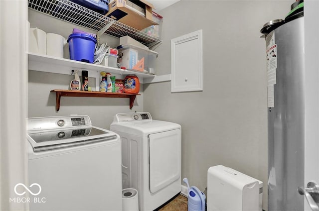 435 Virginia Ave Unit 108, Indianapolis, IN 46203 - laundry area with washing machine and clothes dryer and water heater