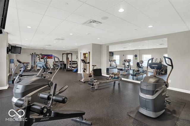 435 Virginia Ave Unit 108, Indianapolis, IN 46203 - exercise room featuring a paneled ceiling and baseboards