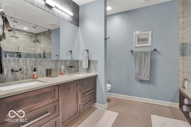 435 Virginia Ave Unit 108, Indianapolis, IN 46203 - full bath with backsplash, double vanity, a shower stall, and toilet
