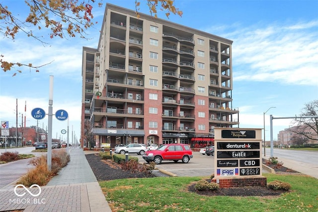 435 Virginia Ave Unit 108, Indianapolis, IN 46203 - view of apartment building / complex featuring uncovered parking