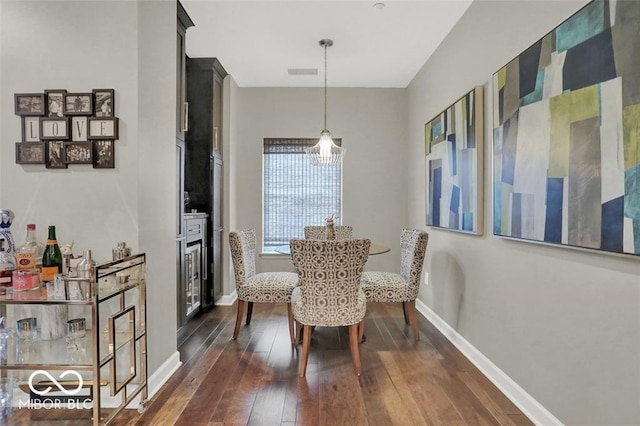 435 Virginia Ave Unit 108, Indianapolis, IN 46203 - dining room featuring dark wood-type flooring and baseboards