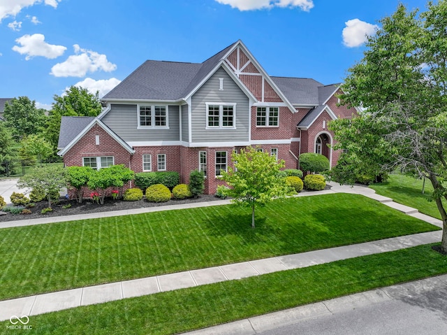 11984 Talnuck Cir, Fishers, IN 46037 - view of front of home featuring brick siding and a front lawn