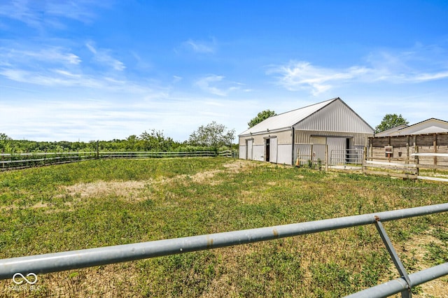 5428 S 525 W, Williamsport, IN 47993 - view of yard with an outdoor structure, a detached garage, an exterior structure, and a rural view