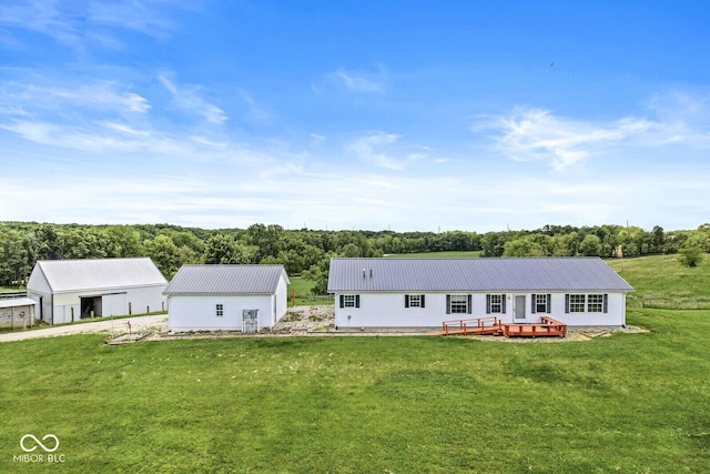 5428 S 525 W, Williamsport, IN 47993 - view of front of house with a front yard, metal roof, and an outbuilding