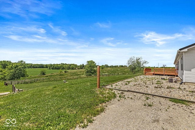 5428 S 525 W, Williamsport, IN 47993 - view of green lawn with a wooden deck, a view of rural / pastoral area, and central air condition unit