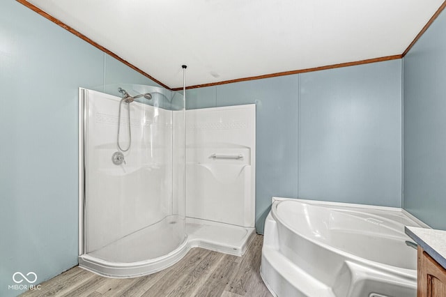 5428 S 525 W, Williamsport, IN 47993 - bathroom with wood finished floors, a walk in shower, a garden tub, vanity, and lofted ceiling