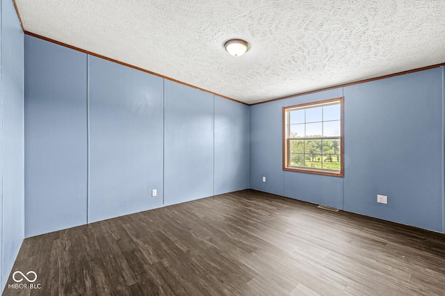 5428 S 525 W, Williamsport, IN 47993 - empty room with ornamental molding, wood finished floors, and a textured ceiling