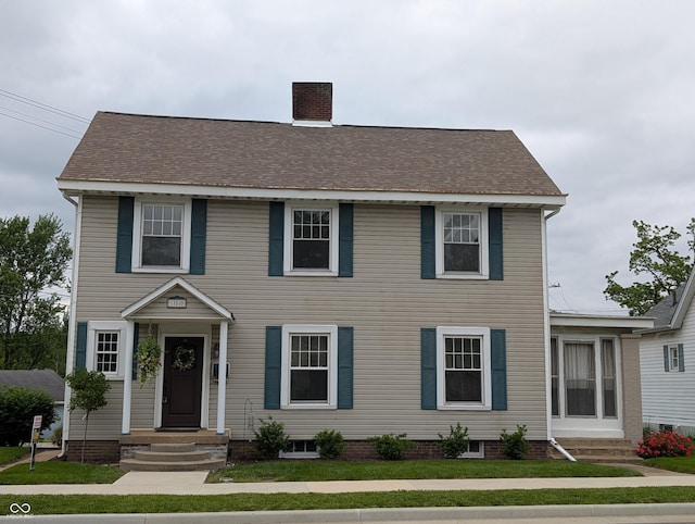 150 W Walnut St, North Vernon, IN 47265 - colonial inspired home with entry steps and a chimney