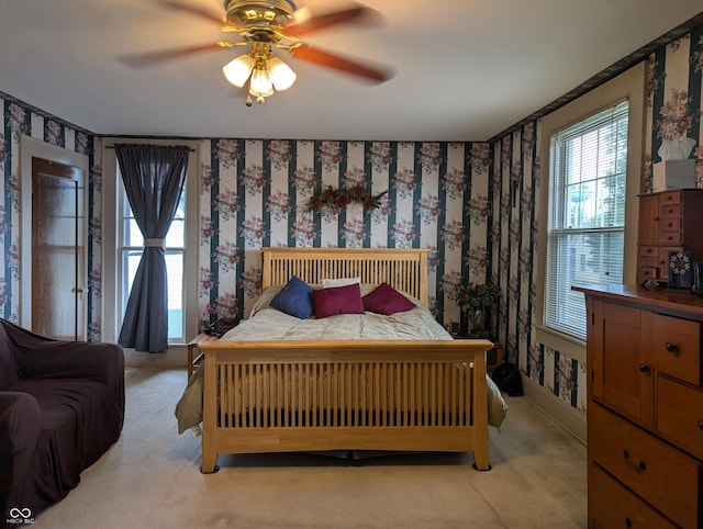 150 W Walnut St, North Vernon, IN 47265 - bedroom featuring wallpapered walls, light carpet, and ceiling fan