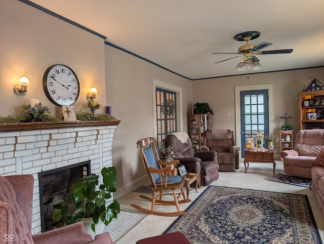 150 W Walnut St, North Vernon, IN 47265 - carpeted living area featuring ceiling fan, a brick fireplace, baseboards, and ornamental molding