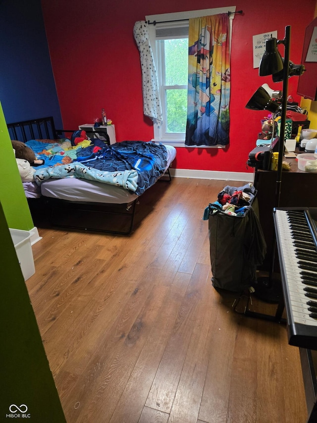 1642 Cleveland Ave, Whiting, IN 46394 - bedroom with hardwood / wood-style flooring and baseboards