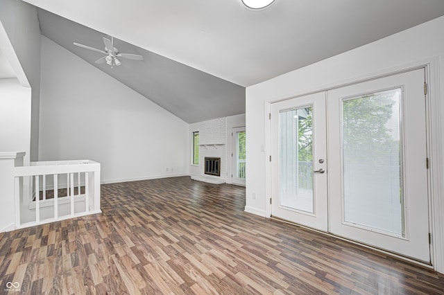 5097 Vantage Point Rd Unit B 2, Avon, IN 46123 - unfurnished living room with french doors, wood finished floors, vaulted ceiling, a ceiling fan, and baseboards
