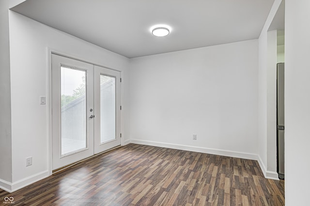 5097 Vantage Point Rd Unit B 2, Avon, IN 46123 - spare room featuring french doors, dark wood finished floors, and baseboards