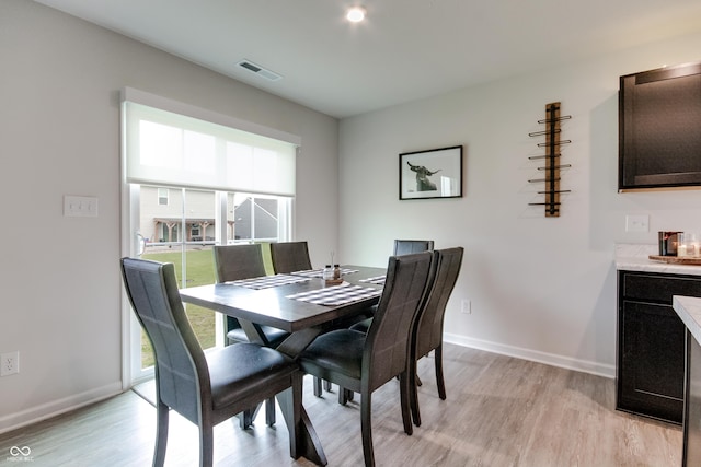 9829 Hulton Rd, Pendleton, IN 46064 - dining space with light wood-type flooring and baseboards