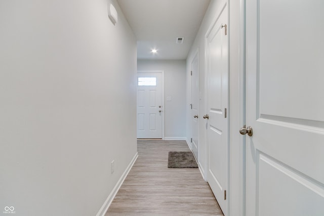 9829 Hulton Rd, Pendleton, IN 46064 - hallway with light wood-style floors, baseboards, and recessed lighting