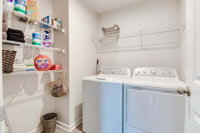 9829 Hulton Rd, Pendleton, IN 46064 - washroom featuring independent washer and dryer and baseboards