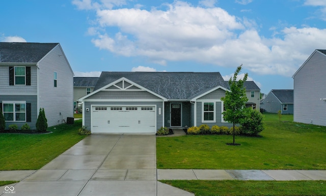 9829 Hulton Rd, Pendleton, IN 46064 - craftsman inspired home featuring a front lawn, an attached garage, driveway, and a shingled roof